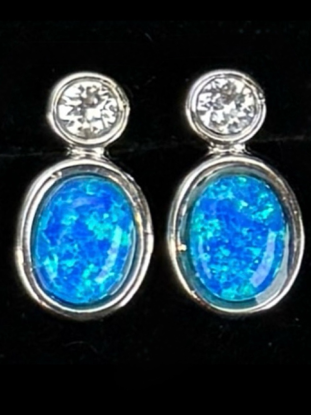 Gorgeous, silvertone, clear bling, vibrant blue pierced earrings